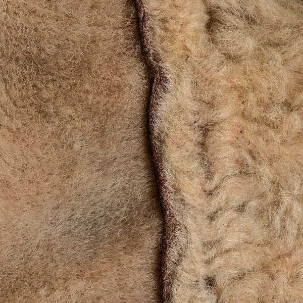 背景として光の茶色の毛皮の裏地のフラグメント — ストック写真