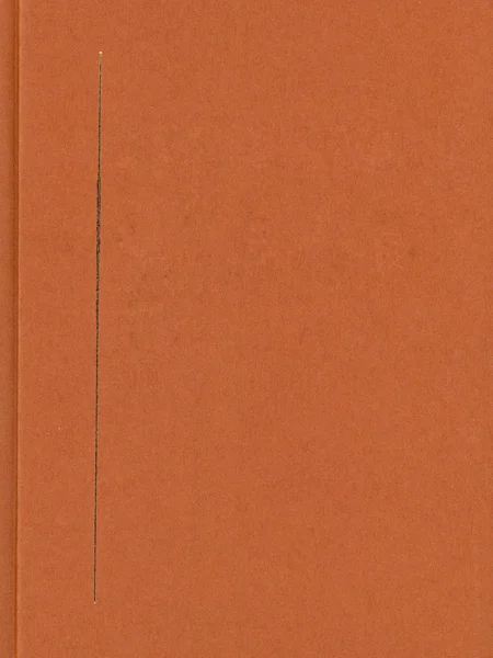 Surface en carton orange avec une fente — Photo