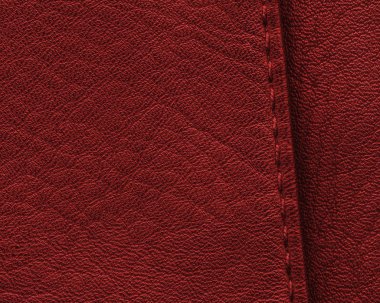 koyu kırmızı deri doku closeup, dikiş