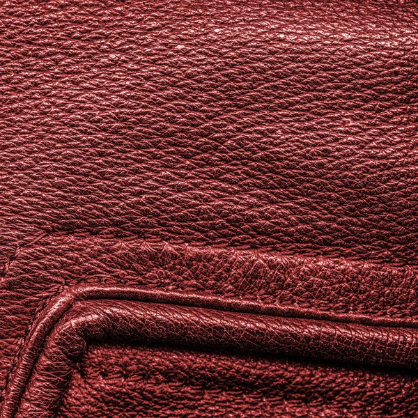 Fragment of leather jacket as red leather background — Stock Photo, Image
