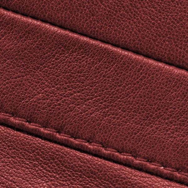 Rood leder texture met naden closeup — Stockfoto