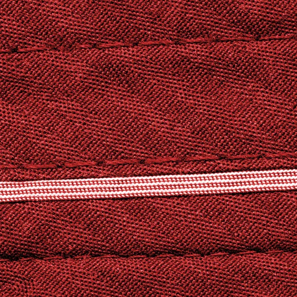 Fondo textil rojo primer plano, cinta, costuras — Foto de Stock