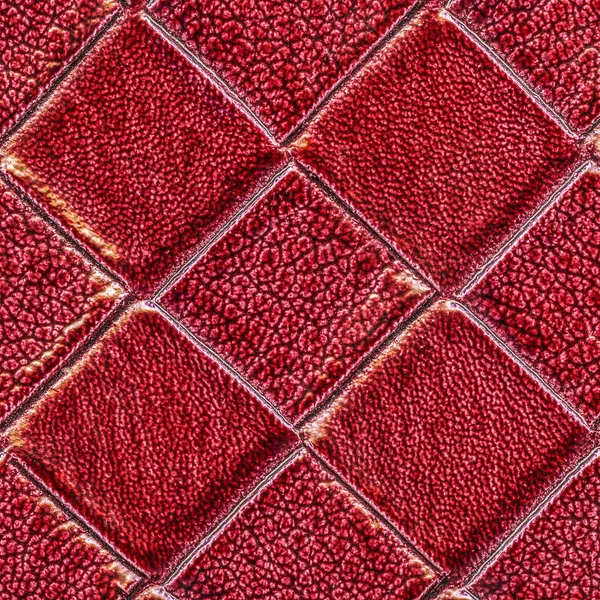 Červená kostkovaná umělé kůže textury. — Stock fotografie