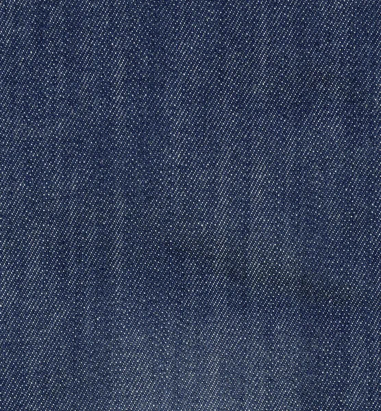 Текстура темных джинсов — стоковое фото