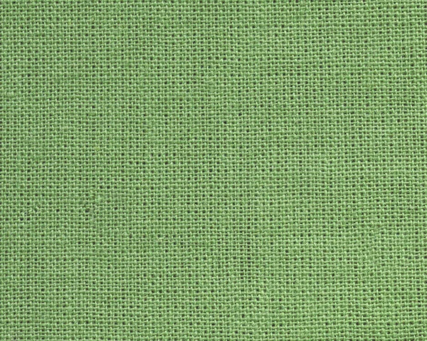 Groene textiel textuur close-up als achtergrond — Stockfoto