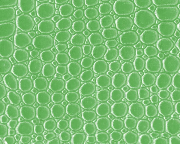 Ljus grön konstgjord orm hud textur närbild — Stockfoto