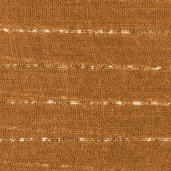 Украшенные люрекс-желтой текстурой ткани — стоковое фото