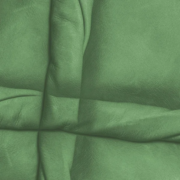 Fragment ženské zelené kožené bundě jako pozadí — Stock fotografie