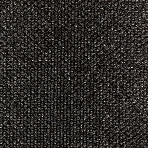 Текстура чорного матеріалу як фон — стокове фото