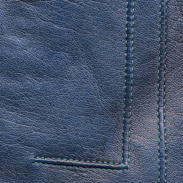 Blauer Lederhintergrund mit dekorativen Nähten — Stockfoto