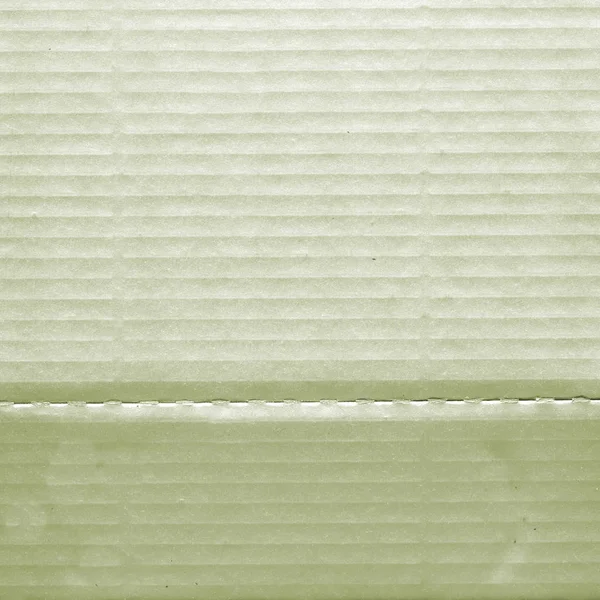 Gri-yeşil oluklu kağıt arka plan — Stok fotoğraf