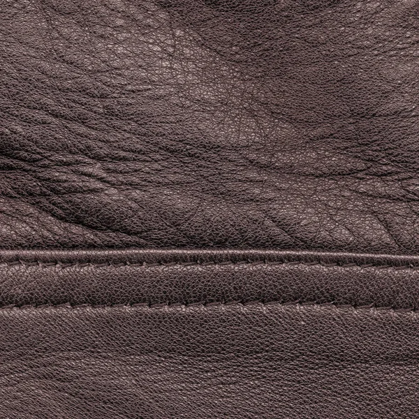 Bruin leder texture, naad. Nuttig als achtergrond — Stockfoto