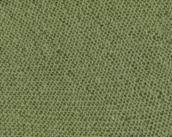Grön stickning tyg textur för bakgrund — Stockfoto