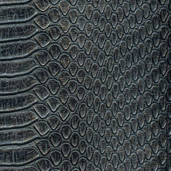 Black artificial snake skin texture — Stock Photo, Image