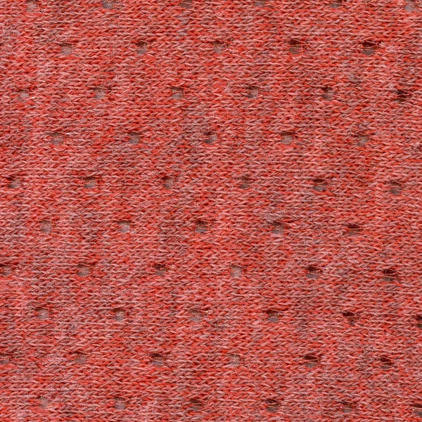 Czerwony tkanina tekstura urządzone z otworami — Zdjęcie stockowe