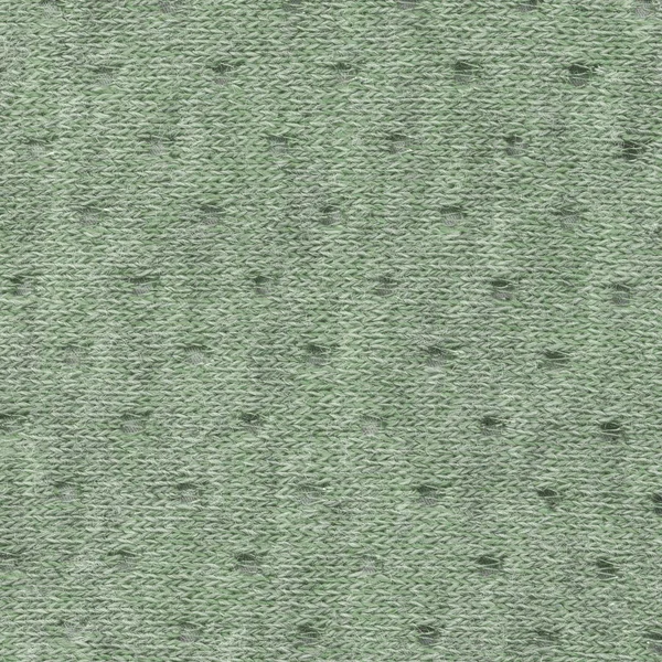 Зелена текстильна текстура з отворами як фон — стокове фото