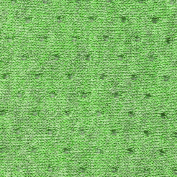 Světle zelená textilní textury s otvory jako pozadí — Stock fotografie