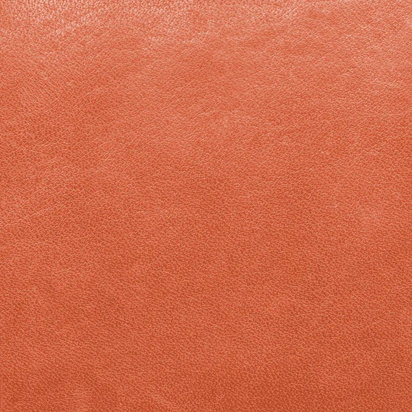 オレンジ色の革のバック グラウンド。デザイン作品の役に立つ — ストック写真