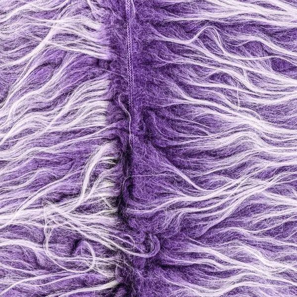 Texture di pelliccia artificiale viola come sfondo — Foto Stock