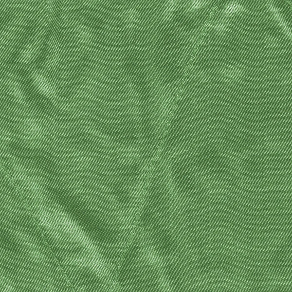 Green textile background with seams — Stock Photo, Image