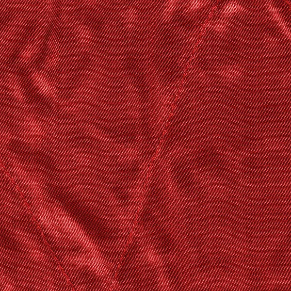 Fundo têxtil vermelho com costuras — Fotografia de Stock