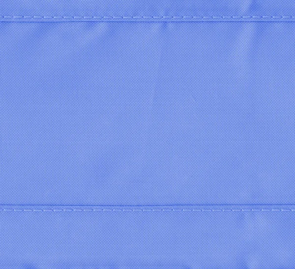 Mavi sentetik malzeme arka plan dikişleri — Stok fotoğraf