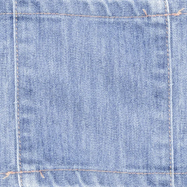 Background of blue denim texture decorated with seams — Stock Photo, Image