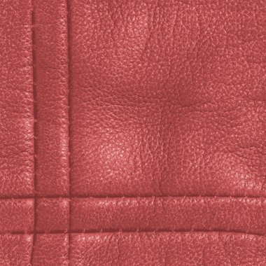 kırmızı deri arka plan dikişleri ile dekore edilmiştir.  