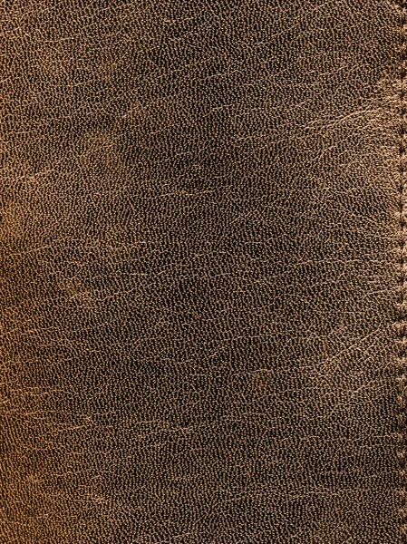 Textura de couro marrom escuro como fundo — Fotografia de Stock