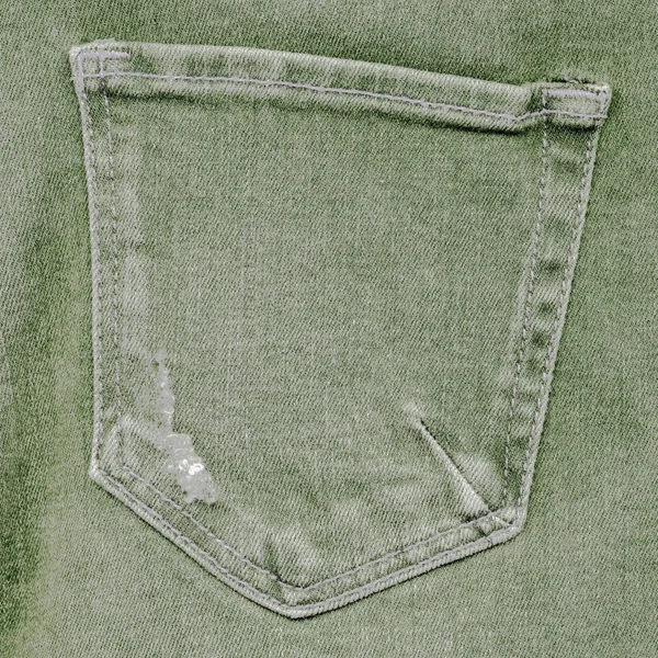 Worn gray-green denim back pocket — Stock Photo, Image