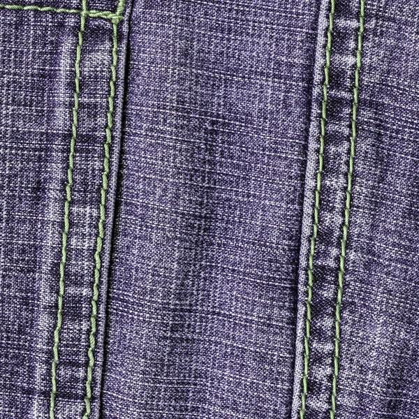 Fondo de textura de mezclilla violeta decorado con costuras —  Fotos de Stock