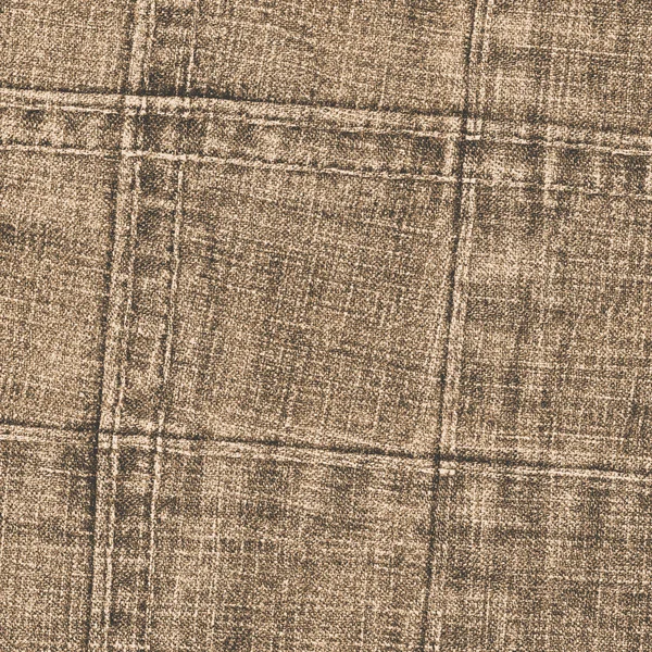 Background of brown denim texture decorated with seams — Stock Photo, Image