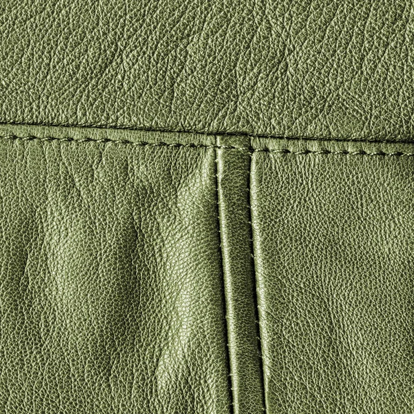 縫い目で飾られたグリーン レザー バック グラウンド — ストック写真