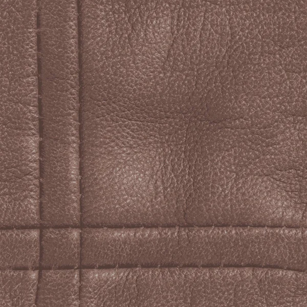 Brown leather background decorated with seams — Stock Photo, Image