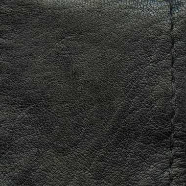 eski siyah deri arka plan bir dikiş ile dekore edilmiştir.