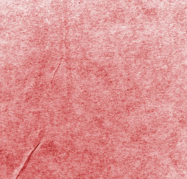 Sheet of packaging  paper painted red , its texture — Stock Photo, Image