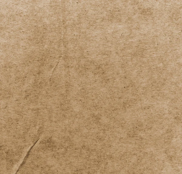 Painted brown sheet of packaging  paper, its texture — Stock Photo, Image