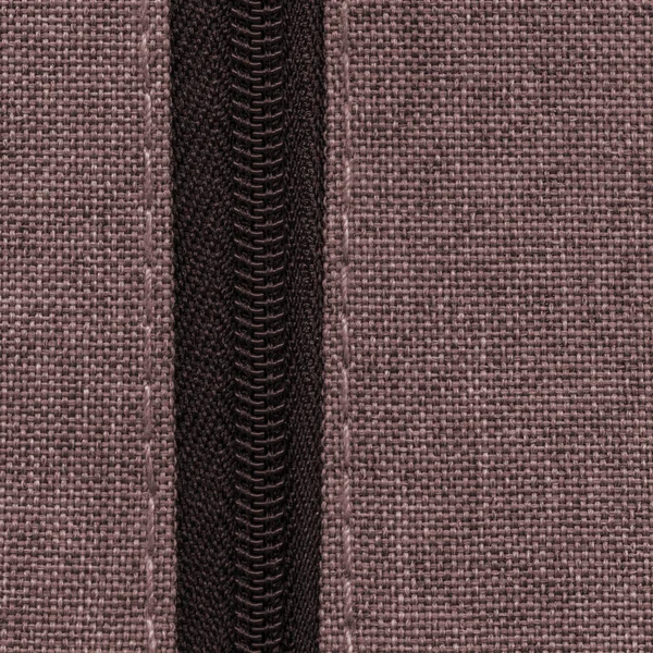 Tło włókienniczych brązowy z zamkiem błyskawicznym — Zdjęcie stockowe