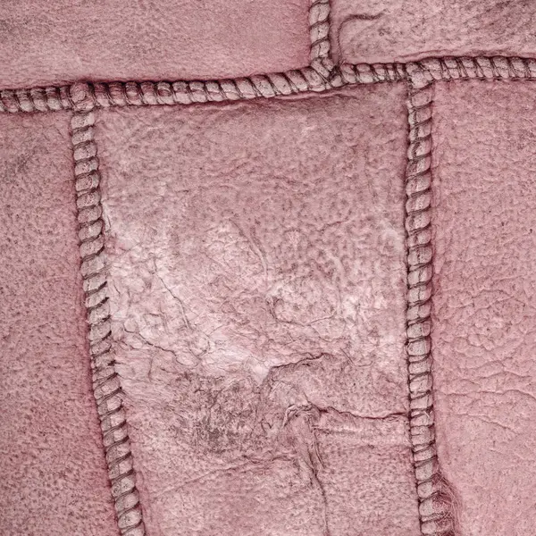 Fragmento do reverso da pele de carneiro velha e desgastada — Fotografia de Stock