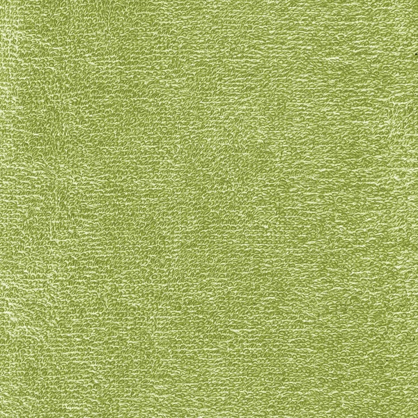 Groene achtergrond op basis van textiel textuur — Stockfoto