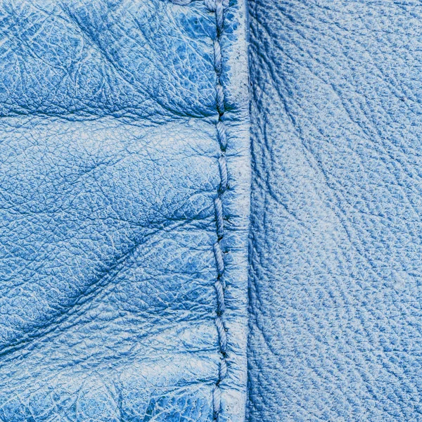 Fragment of blue leather coat as background — Stock Photo, Image