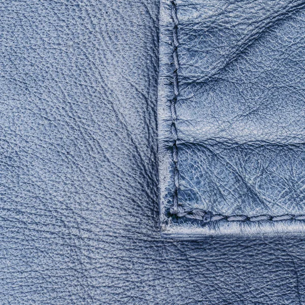 Fragment van blauwe leren jas als achtergrond — Stockfoto