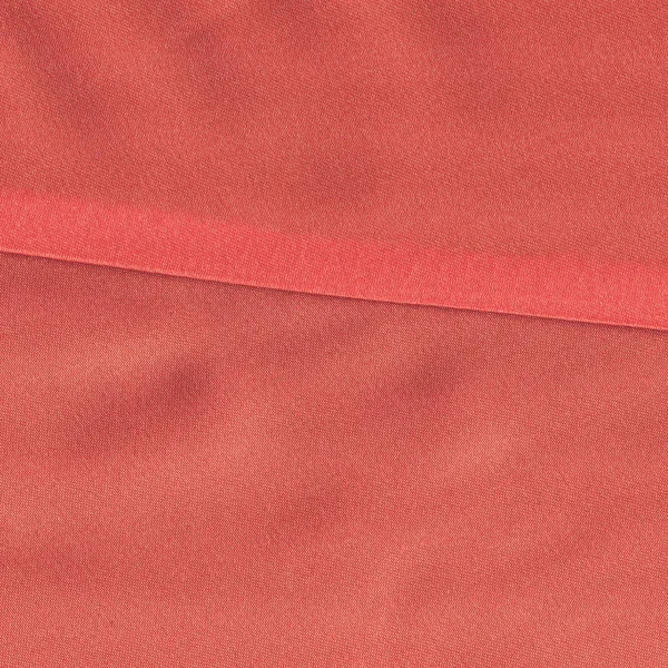 Kırmızı kumaş arka plan, arka plan olarak yararlı — Stok fotoğraf