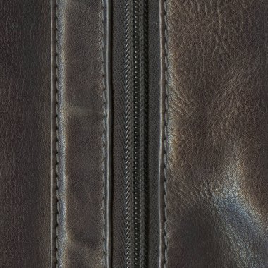 kahverengi deri arka plan bir fermuar ile