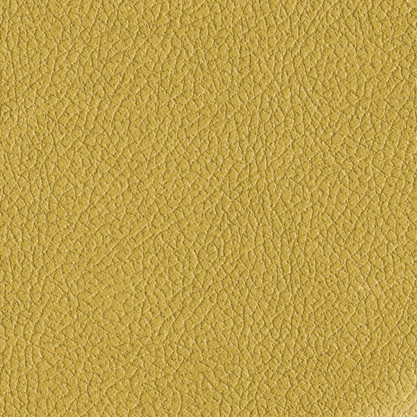 Textura de couro artificial amarelo para fundo — Fotografia de Stock