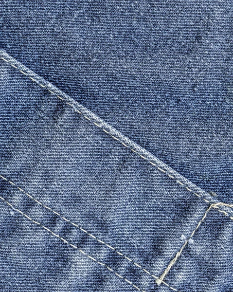 Fondo jean azul decorado con costuras —  Fotos de Stock
