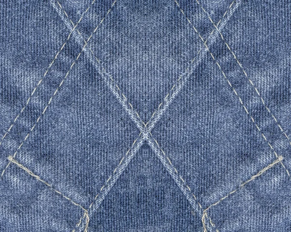 Голубой джинсовой фон, украшенный швами — стоковое фото