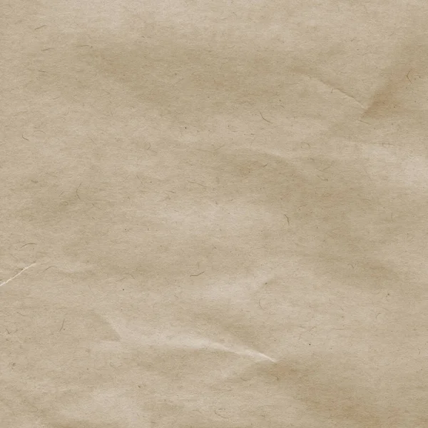 Fragment of old sheet of packing paper closeup — Stock Photo, Image