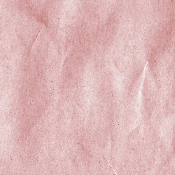 Fragment of old reddish sheet of paper closeup — Stock Photo, Image