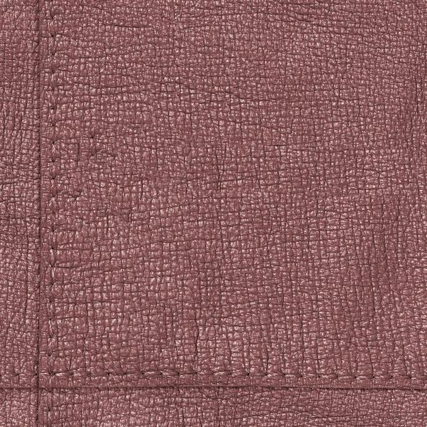 Textura de couro vermelho-marrom decorado com uma costura — Fotografia de Stock
